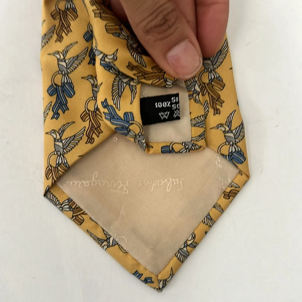 Salvatore Ferragamo 100% Silk yellow tie with birds pattern blue / yellow tones